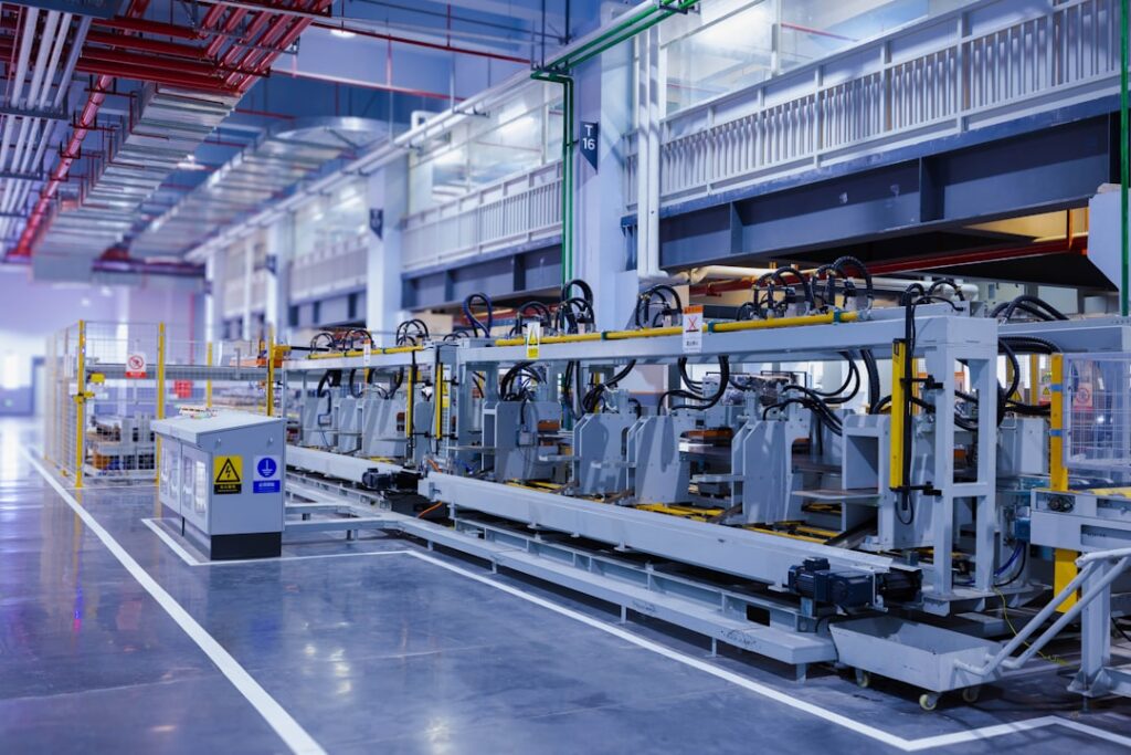 grey industrial machine showing static warning.
